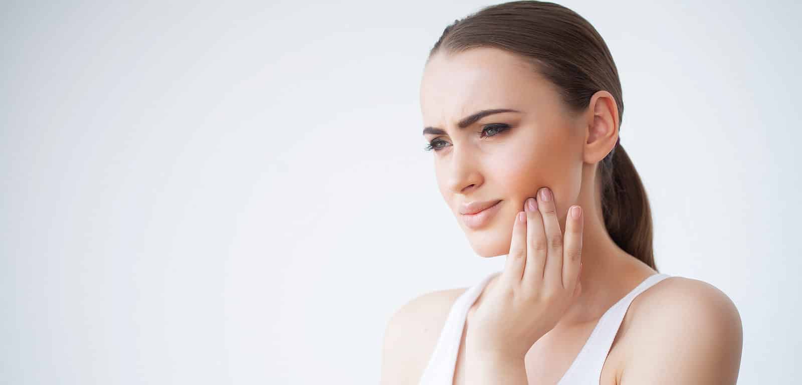 Woman with tooth pain