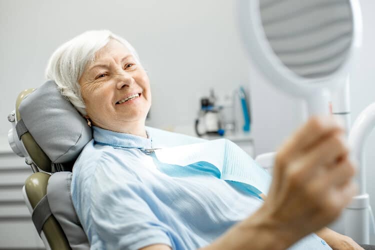 Using Dental Implants to Straighten Teeth